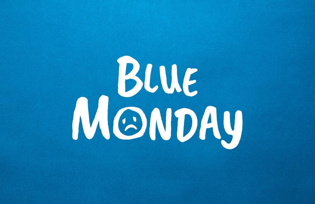 The words "Blue Monday" with a sad face doodled in the letter 'O'