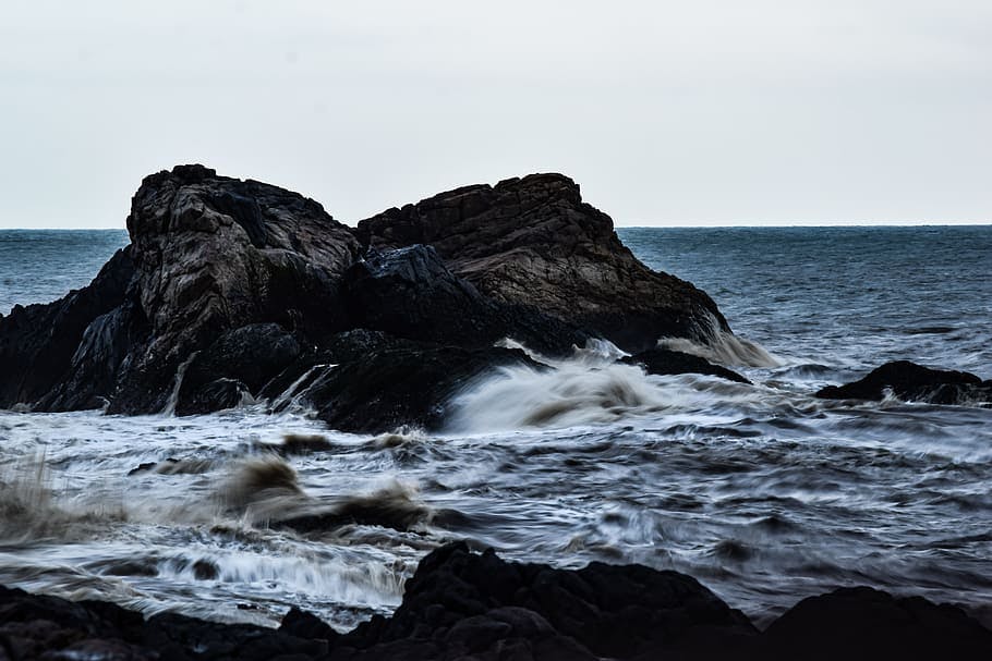 Ocean waves against a rock